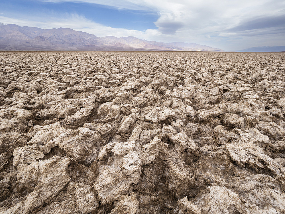 The Devil's Golf Course, a large salt pan filled with halite salt crystal, Death Valley National Park, California, United States of America, North America