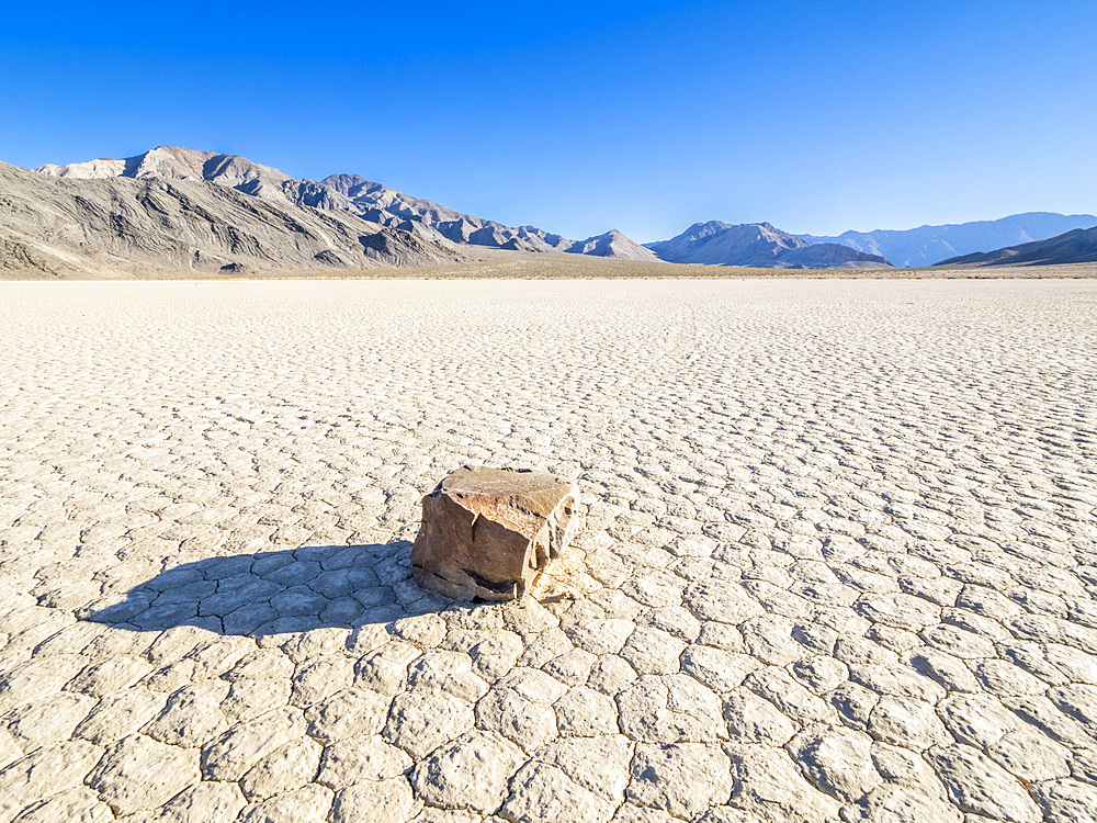 A moving rock at the Racetrack, a playa or dried up lakebed, in Death Valley National Park, California, United States of America, North America