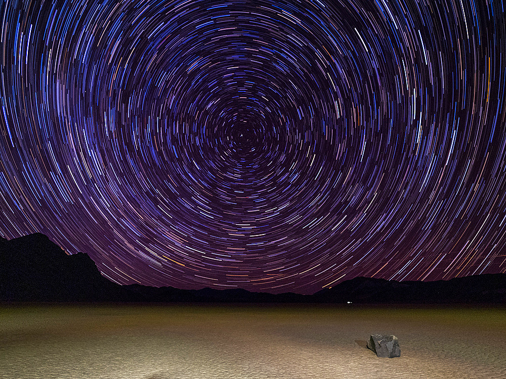 Night photo of stars, the Racetrack, a playa or dried up lakebed, in Death Valley National Park, California, United States of America, North America