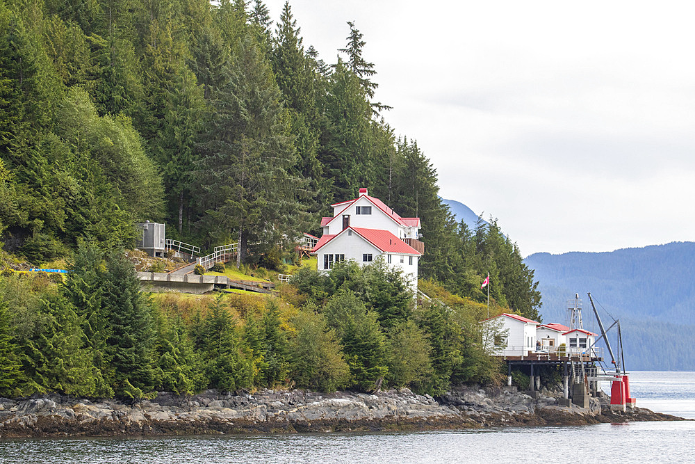 Remote lighthouse along the coastline Boat Bluff in British Columbia, Canada.