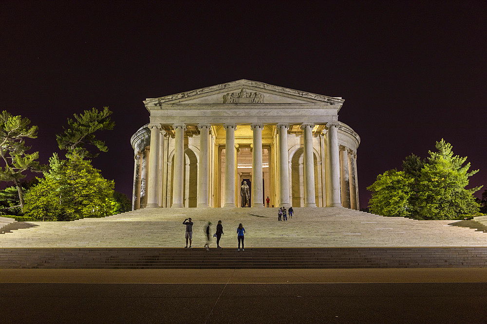 A night view of the Thomas Jefferson Memorial, lit up at night in West Potomac Park, Washington, D.C.