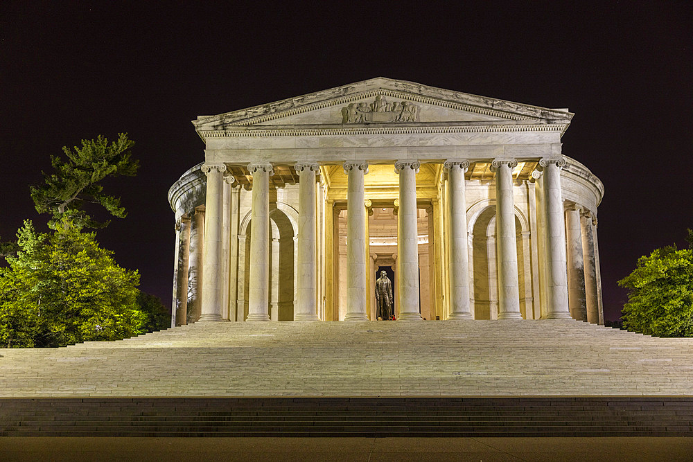 A night view of the Thomas Jefferson Memorial, lit up at night in West Potomac Park, Washington, D.C.