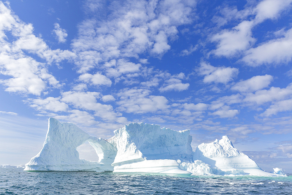 Huge iceberg from the nearby Ilulissat Icefjord floating near Ilulissat, formerly Jakobshavn, Western Greenland, Polar Regions