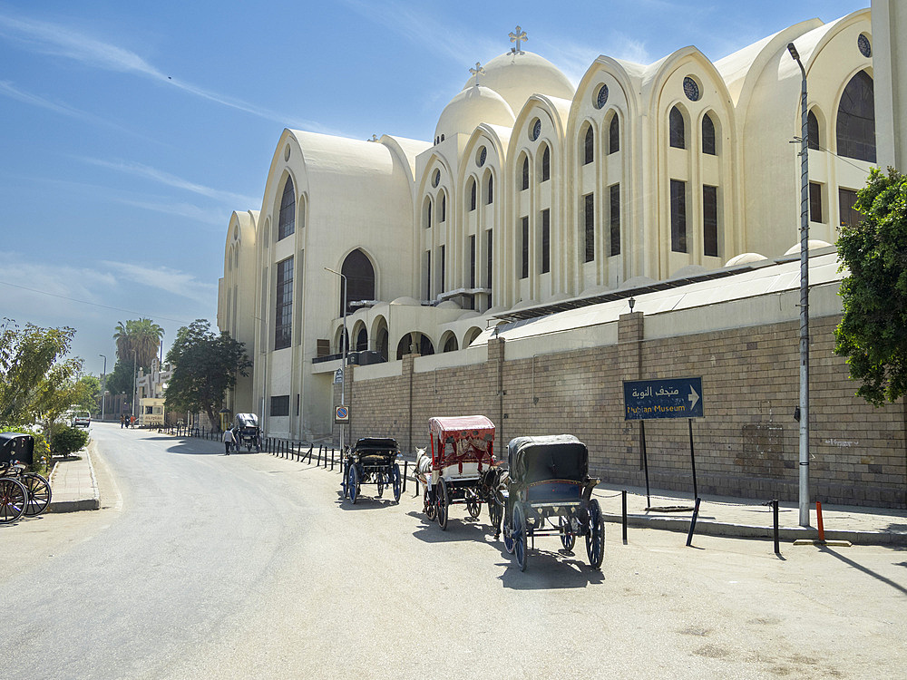 Horse drawn carriages waiting for passengers at the Nubian Museum in the city of Aswan, Egypt, North Africa, Africa