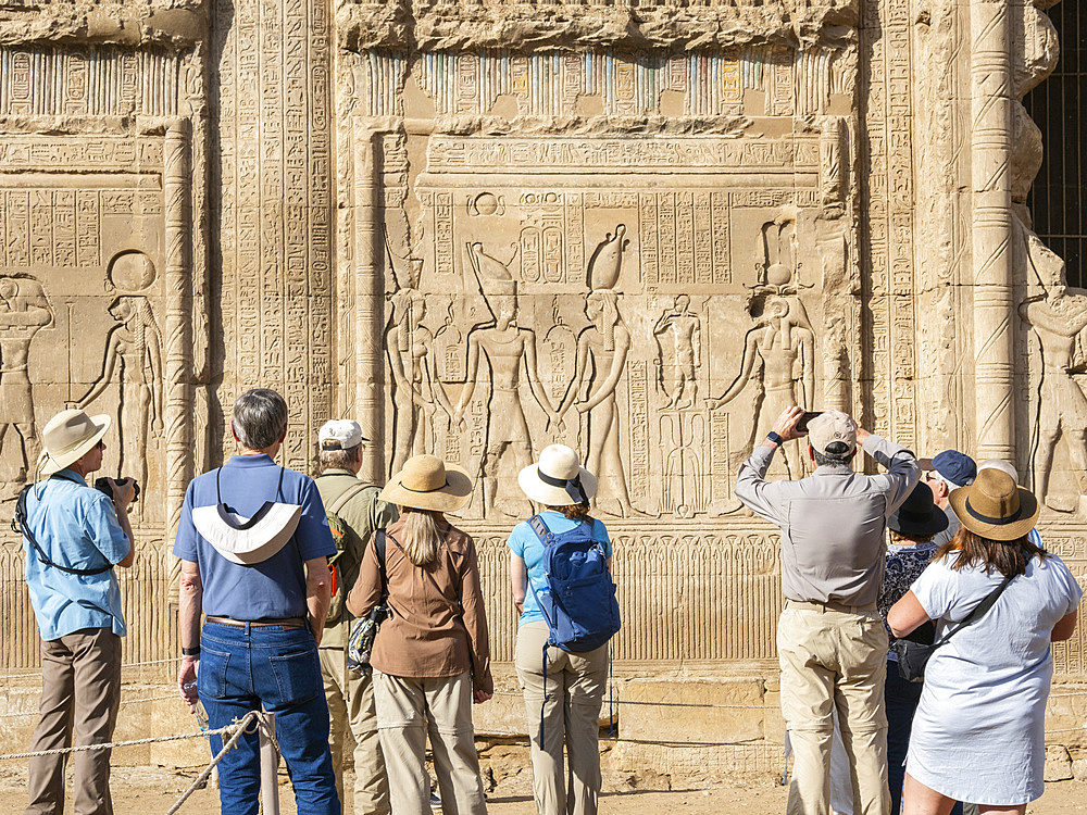 Tourists at the Temple of Hathor, which began construction in 54 BCE, part of the Dendera Temple complex, Dendera, Egypt, North Africa, Africa