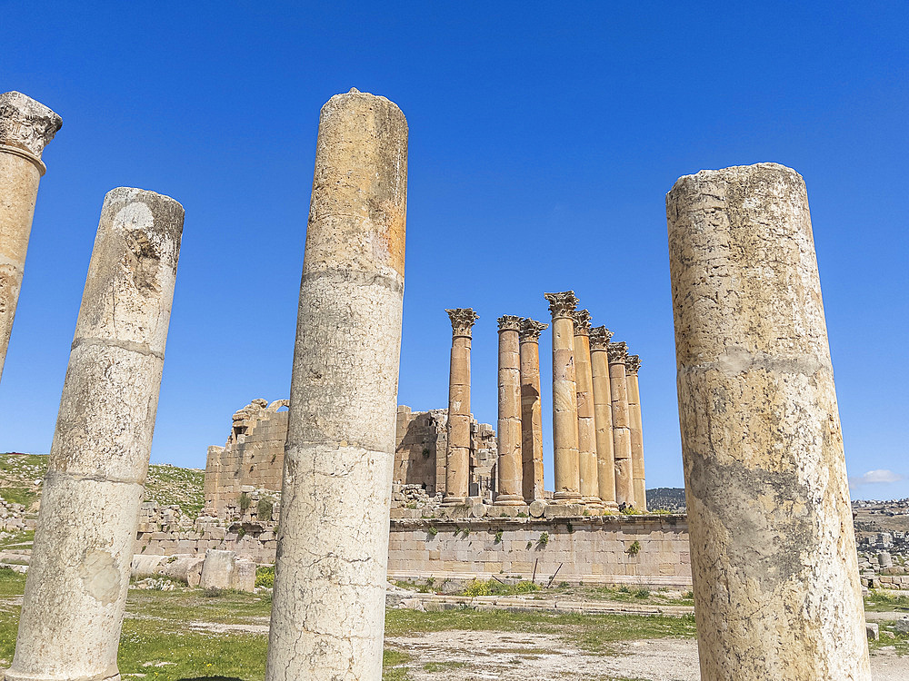 Columns frame a building in the ancient city of Jerash, believed to be founded in 331 BC by Alexander the Great, Jerash, Jordan, Middle East