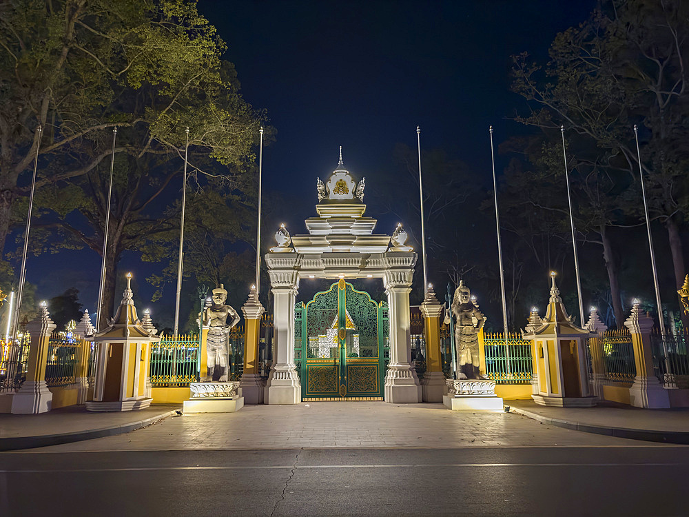 Entrance gate to a government building at night in Siem Reap, Cambodia, Indochina, Southeast Asia, Asia