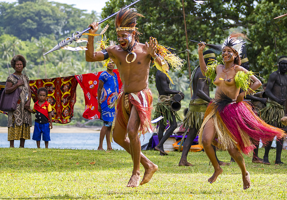 Six different groups of native warriors, drummers, and dancers perform on Kwato Island, Papua New Guinea, Pacific