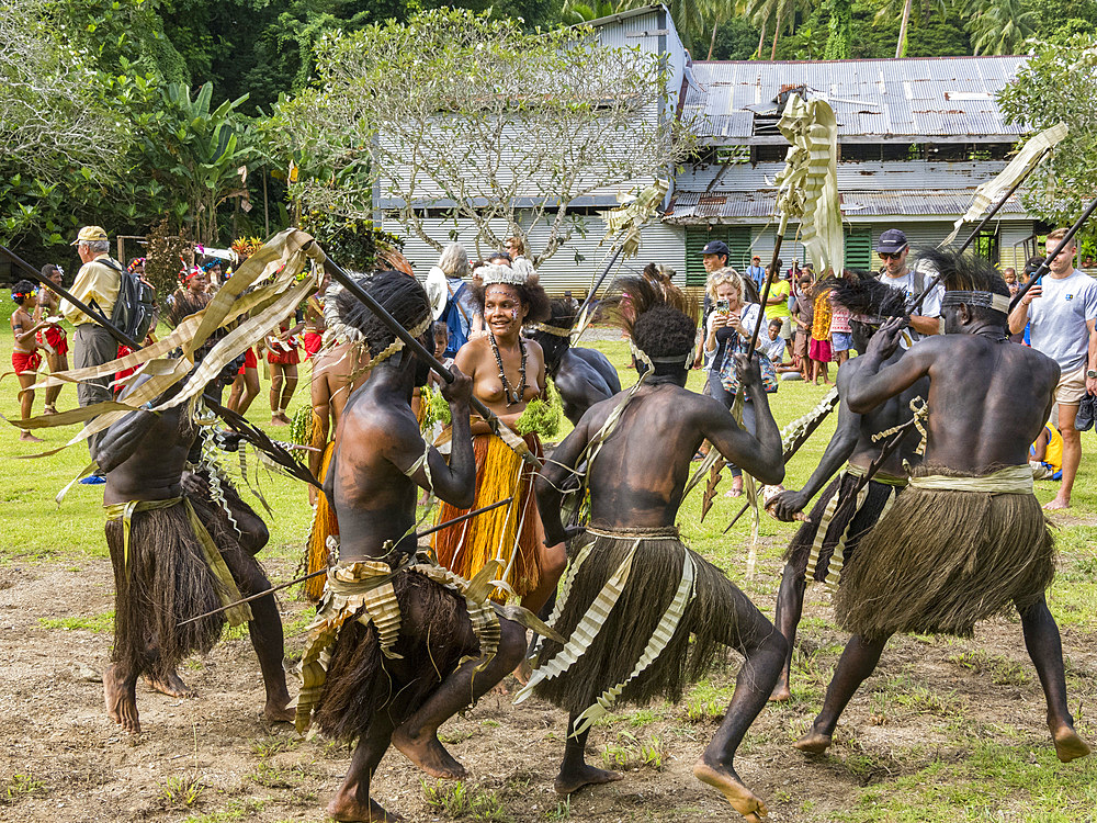 Six different groups of native warriors, drummers, and dancers perform on Kwato Island, Papua New Guinea, Pacific