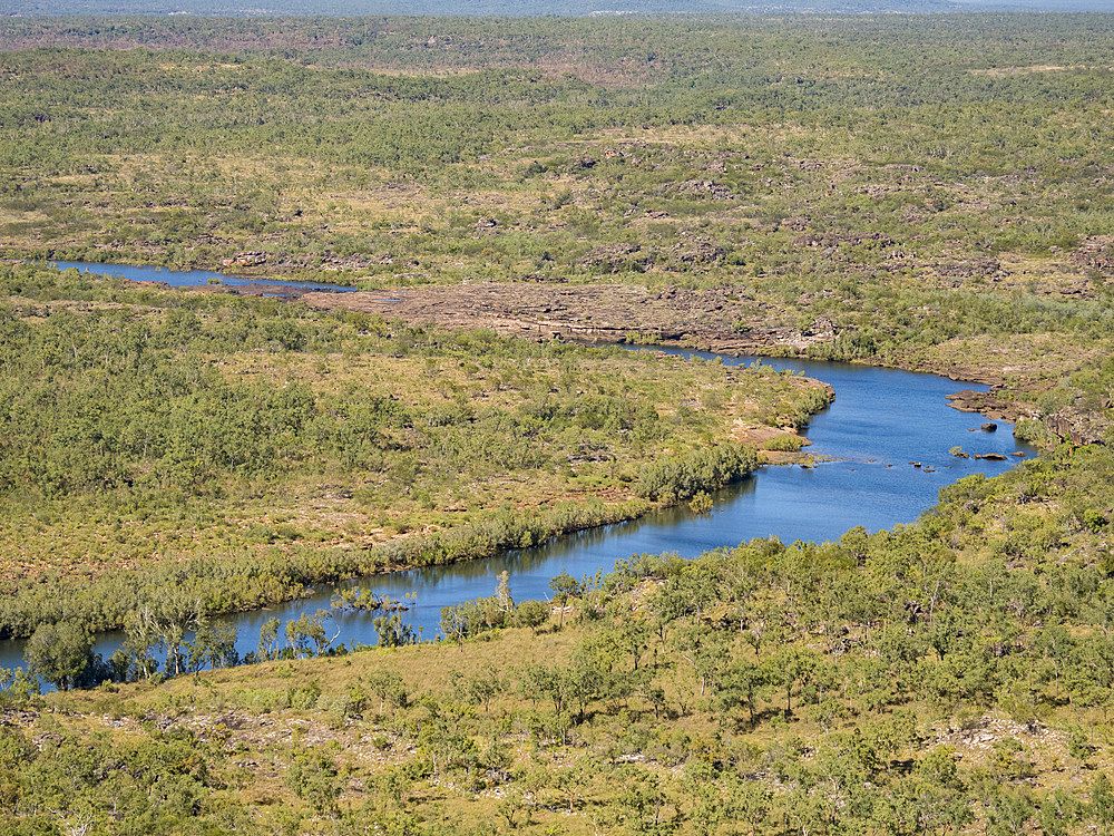 A view of the Mitchell River meandering towards Swift Bay as seen from a commercial helicopter, Kimberley, Western Australia, Australia, Pacific