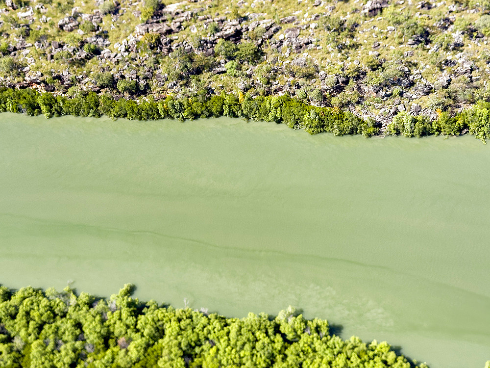 A view of the Mitchell River meandering towards Swift Bay as seen from a commercial helicopter, Kimberley, Western Australia, Australia, Pacific