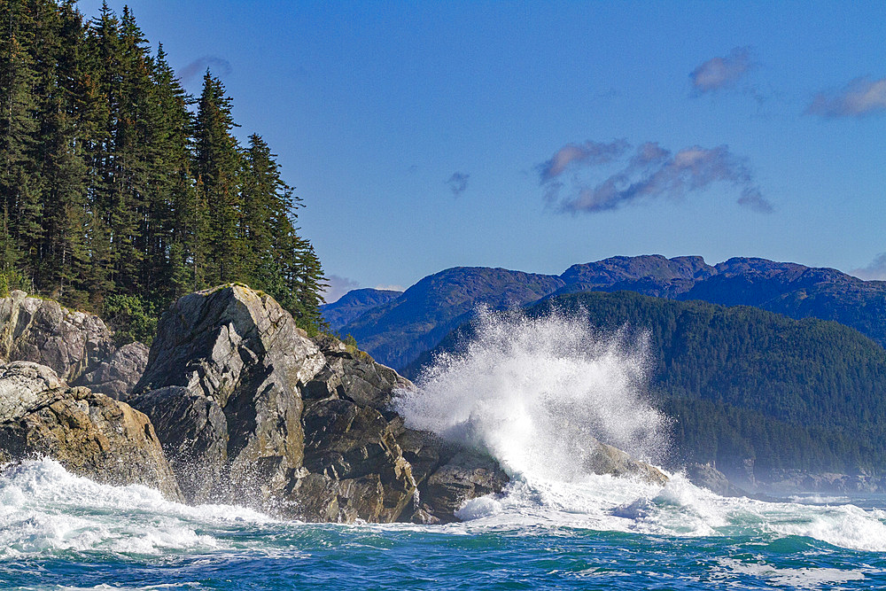 Waves crashing against the shore in Cross Sound, Southeast Alaska, United States of America, North America