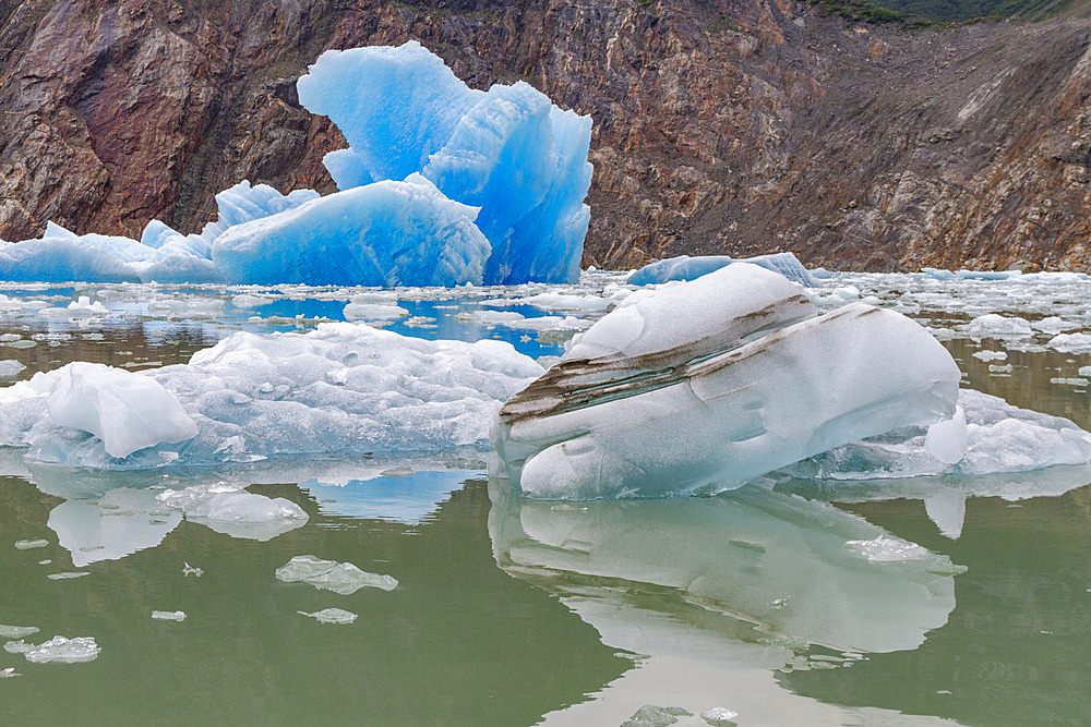 Glacial iceberg detail from ice calved off the South Sawyer Glacier in Tracy Arm, Southeast Alaska, United States of America, North America