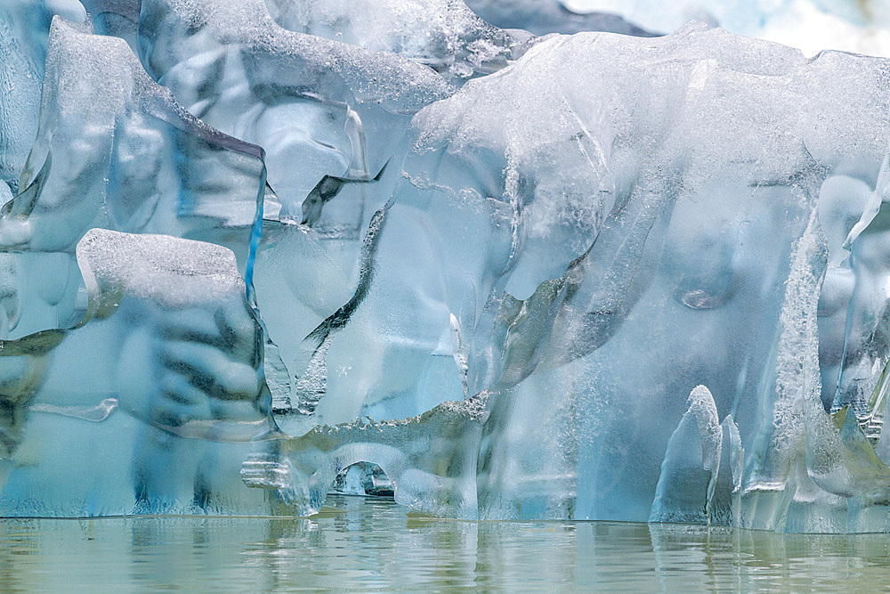 Glacial iceberg detail from ice calved off the South Sawyer Glacier in Tracy Arm, Southeast Alaska, Pacific Ocean, United States of America, North America