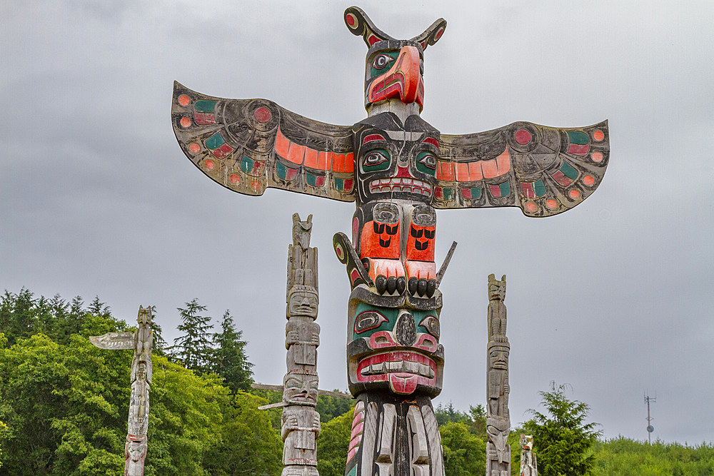 Totem poles in the cemetery of the First Nations Kwakwaka'wakw people in Alert Bay, British Columbia, Canada, North America