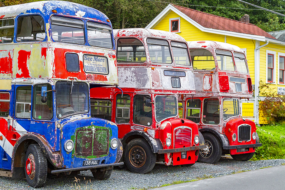 London double-decker buses in the First Nations Kwakwaka'wakw people's town of Alert Bay, British Columbia, Canada, North America