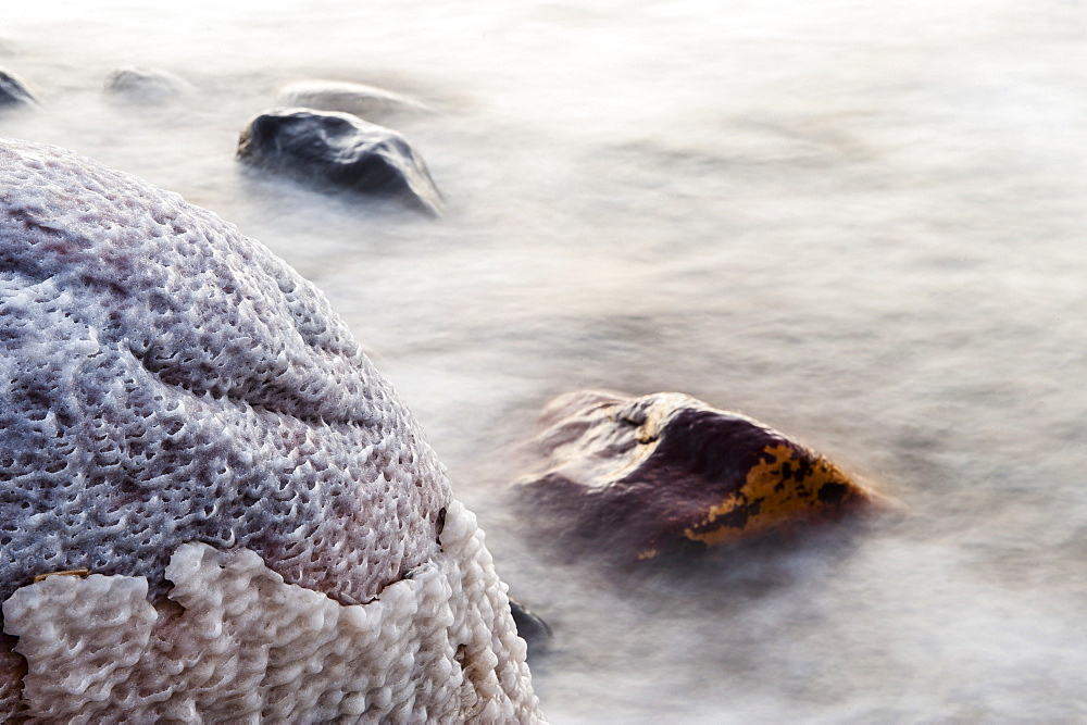 Salt encrusted stone in Dead Sea, Jordan, Middle East