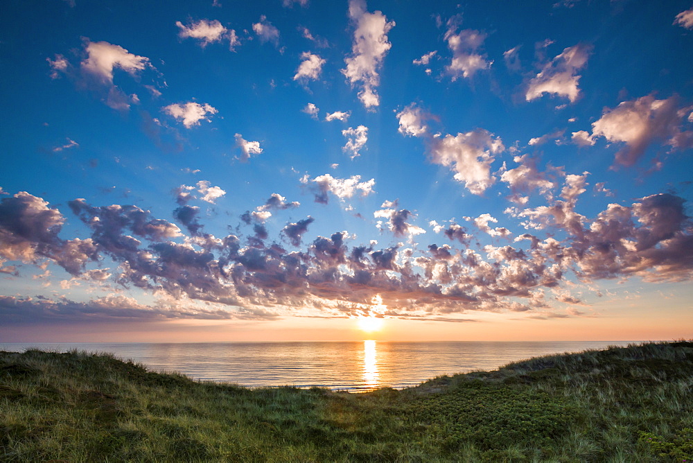 Sunset over the sea, Wenningstedt, Sylt Island, North Frisian Islands, Schleswig-Holstein, Germany