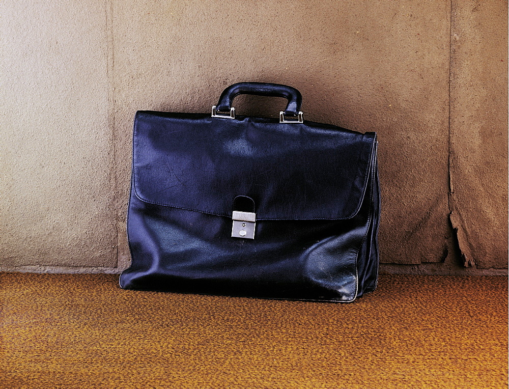 Briefcase against a wall, Business, Work