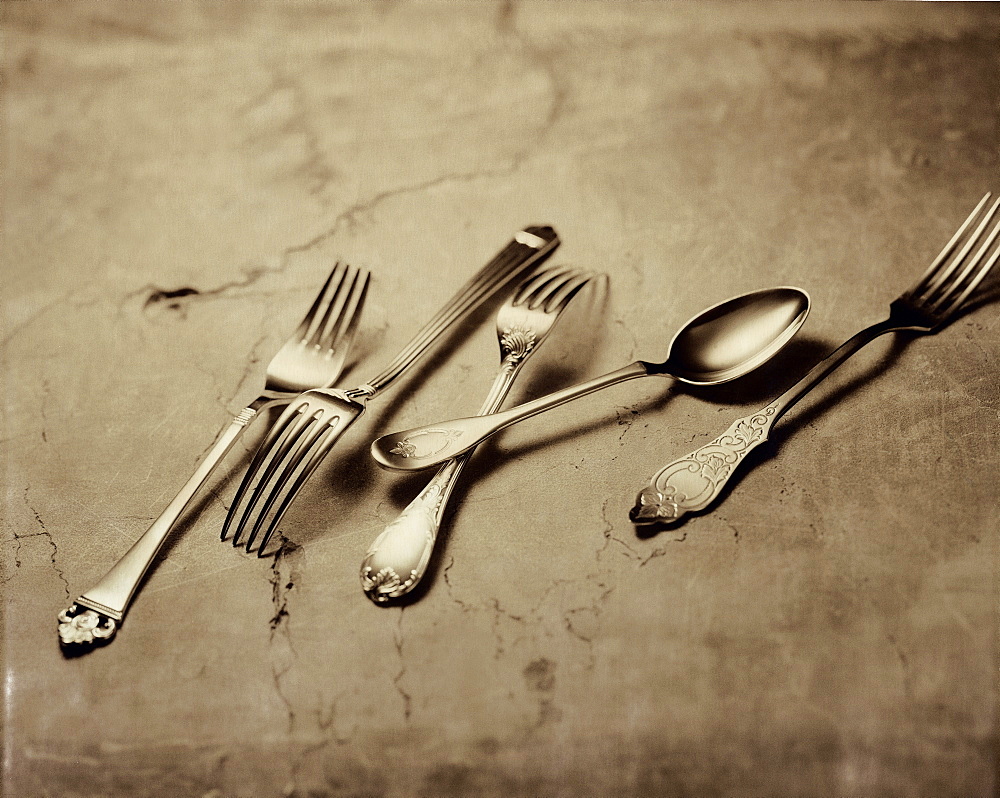 Various old cutlery on a table, Forks and Spoons, Cutlery