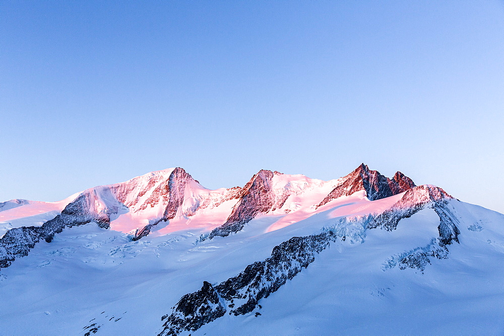 Grosses Wannenhorn, Schoenbuehlhorn, Fiescher Gabelhorn and Wyssnollen in the first morning light, Wallis, Switzerland