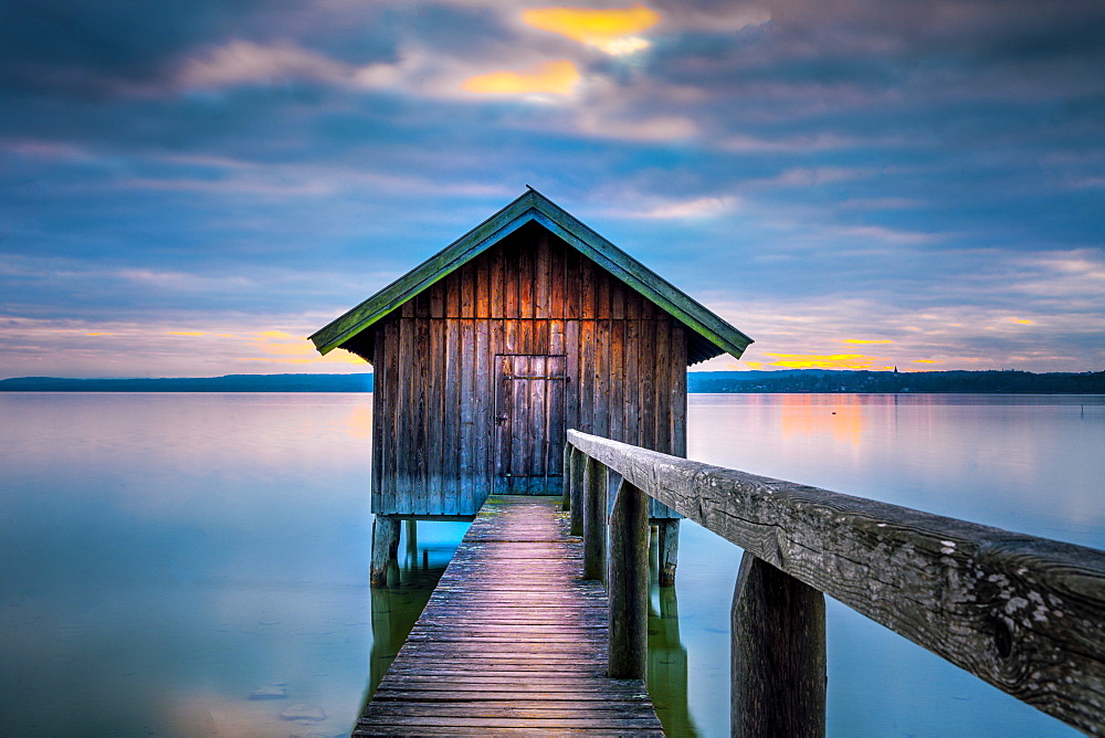 Boathouse at sunset on Ammersee, Stegen, Bavaria, Germany