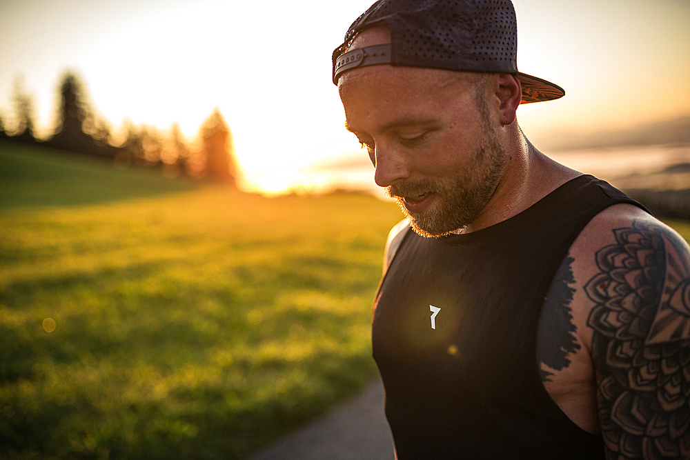 Runner enjoys the sunrise in the morning hours, running, sports, allgäu