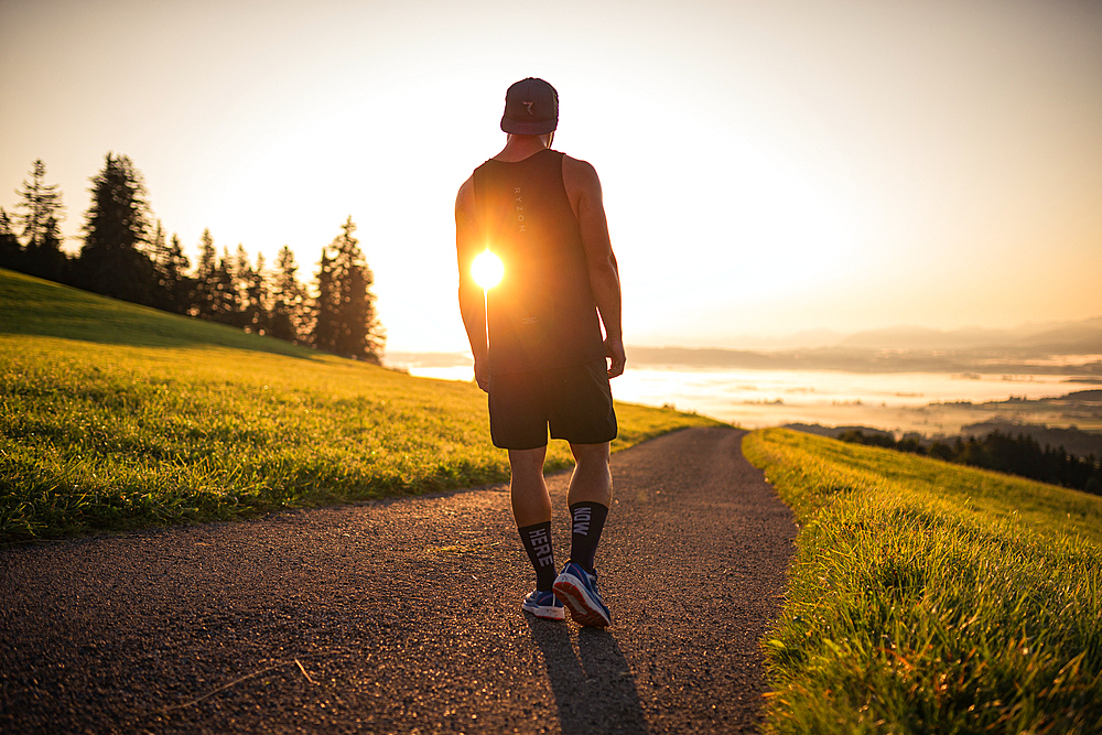 Runner enjoys the sunrise in the morning hours, running, sports, allg? U