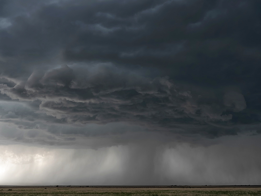 Dramatic skies over the landscape seen during a storm chasing tour in the midwest of the United States, Kansas, United States of America