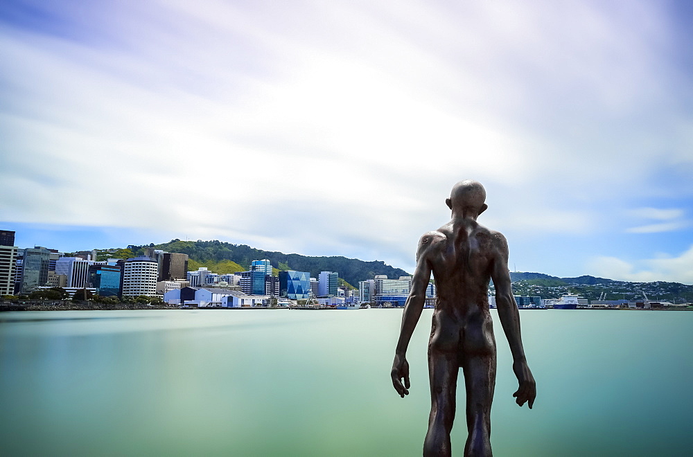 Statue of a clothesless man in the port of Wellington City, Wellington, North Island, New Zealand