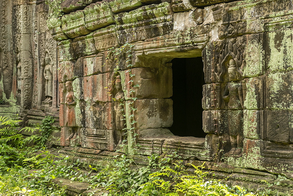 Window in stone wall decorated with bas-reliefs, Preah Khan, Angkor Wat, Siem Reap, Siem Reap Province, Cambodia