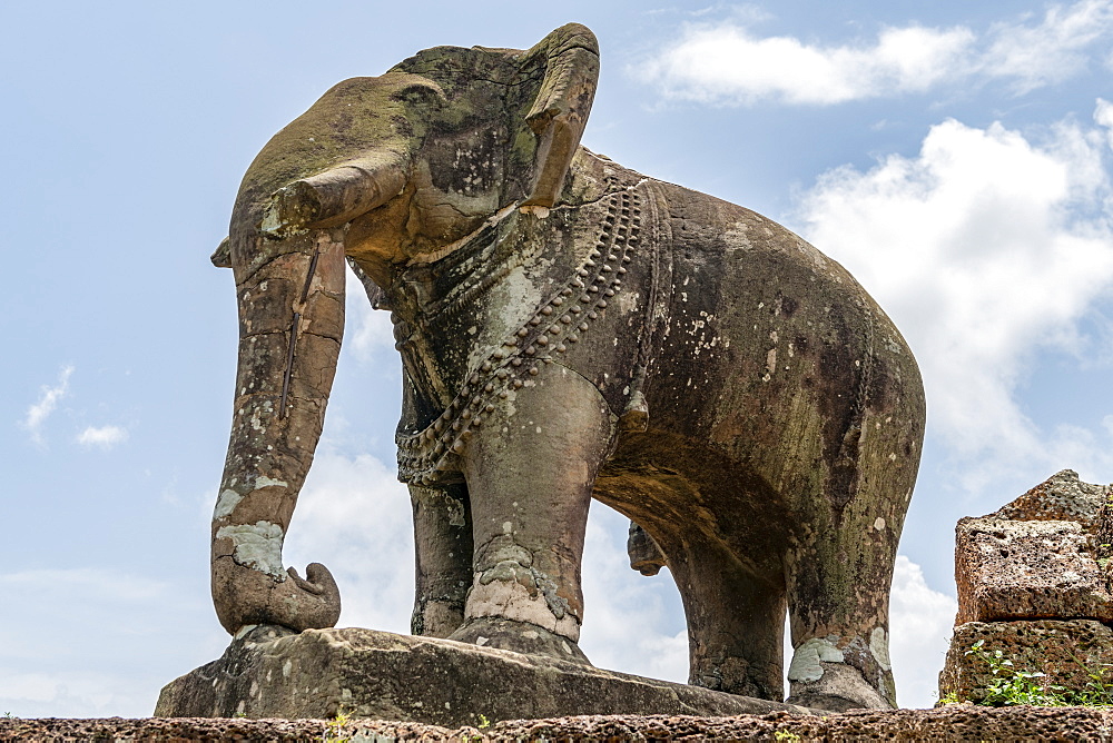 Stone elephant at corner of ruined temple, East Mebon, Chang Puak Camp, Angkor Wat, Siem Reap, Siem Reap Province, Cambodia