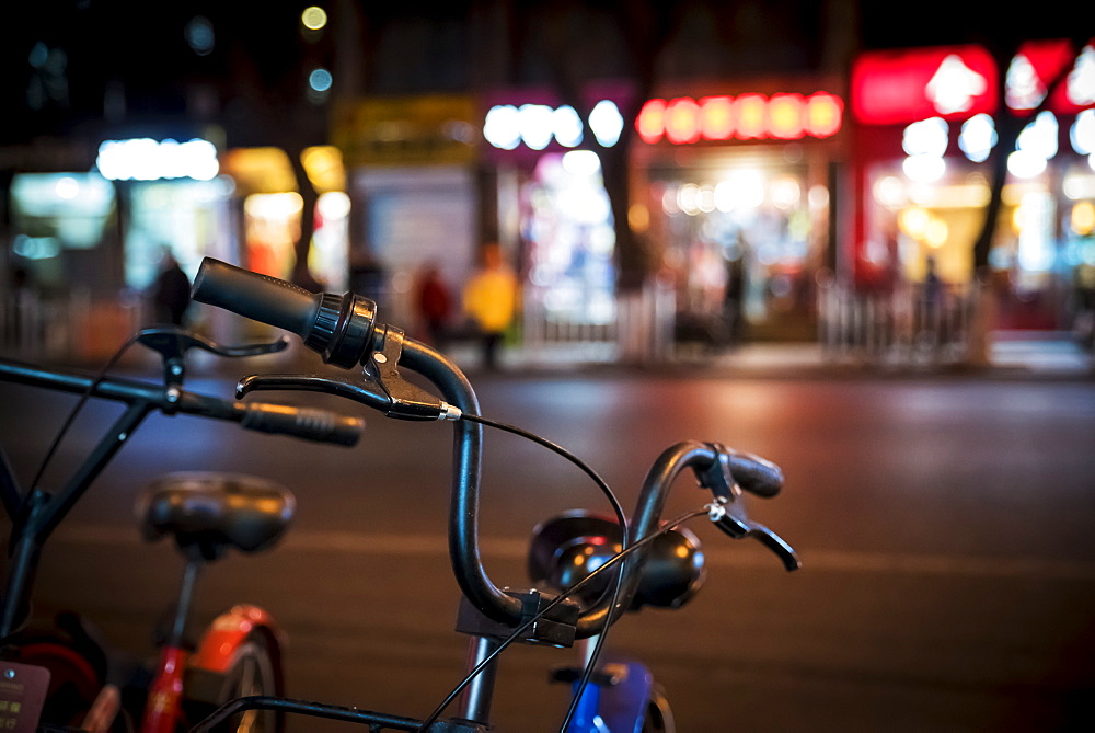 Bicycles and city lights, Beijing, China