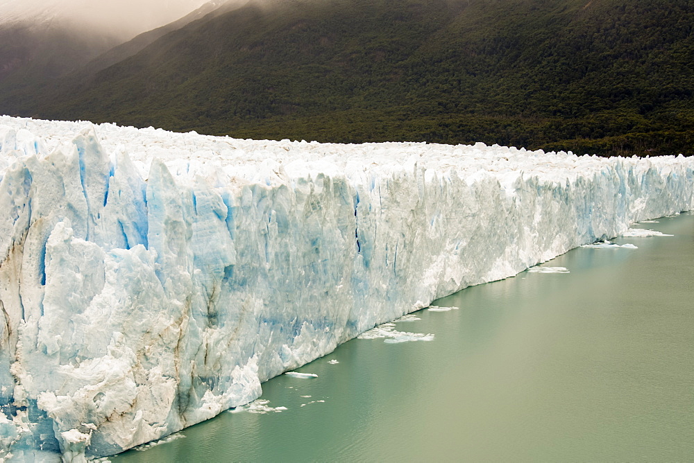 The Perito Moreno Glacier up close showing the blue ice and green water, Cafayate, Santa Cruz Province, Argentina