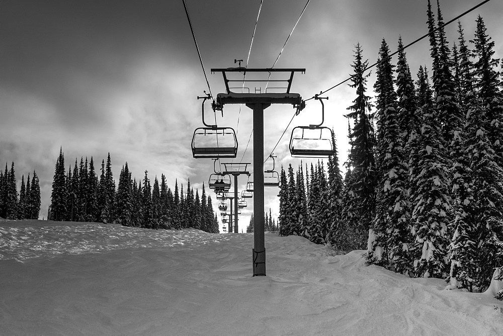 Chair lift at a ski resort in winter, Sun Peaks, British Columbia, Canada