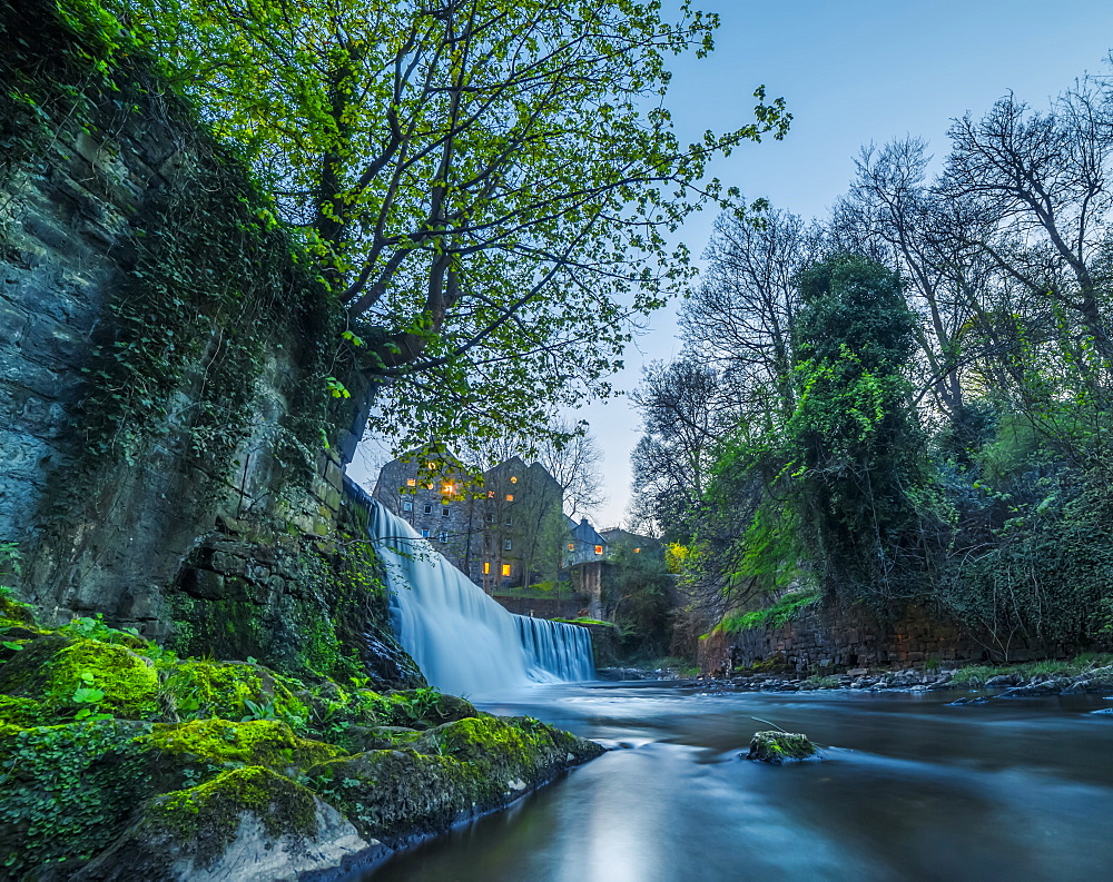 Edinburgh waterfall surrounded by medieval buildings, Edinburgh, Scotland