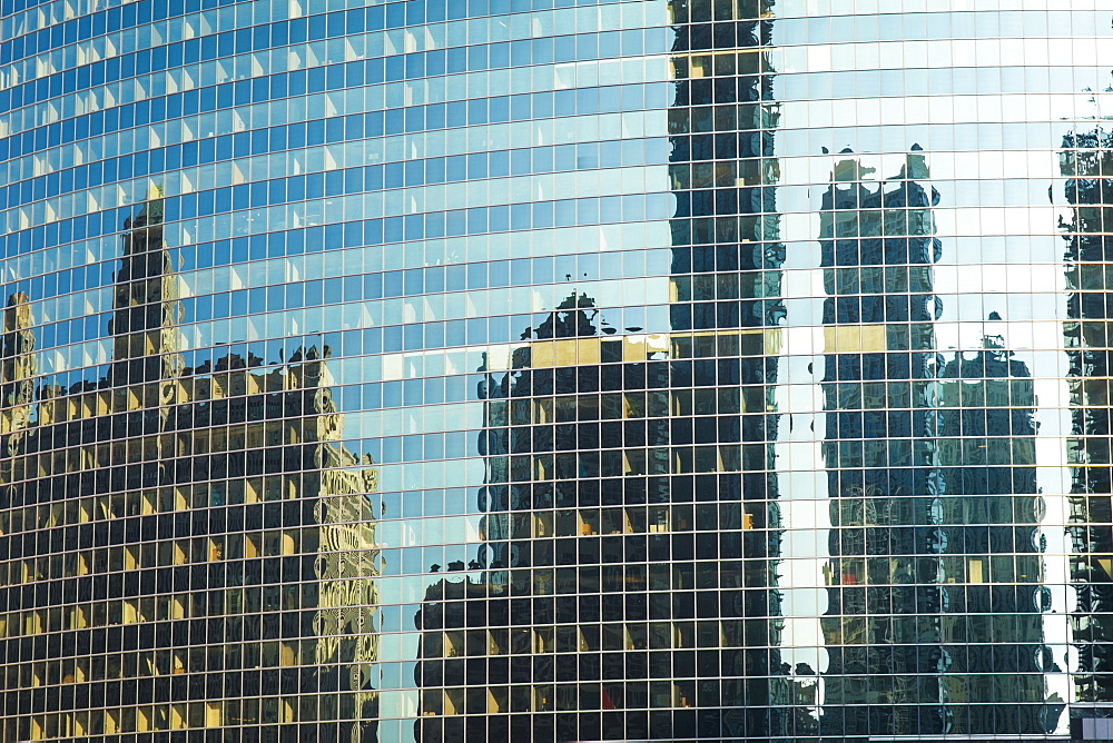 Reflection of skyscrapers in the glass facade of a building, Chicago, Illinois, United States of America