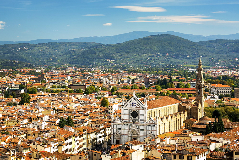 View over Florence with Santa Croce church and mountain range in the background, Florence, Tuscany, Italy