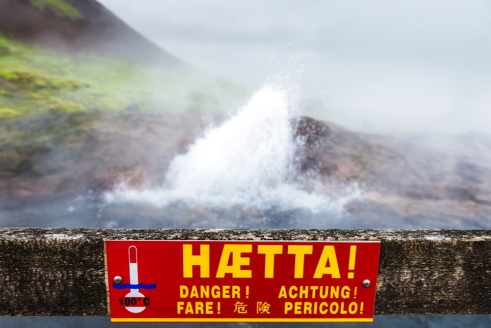 Warning sign in front of Europe's largest hot water spring, Kleppjarnsreykir, Iceland