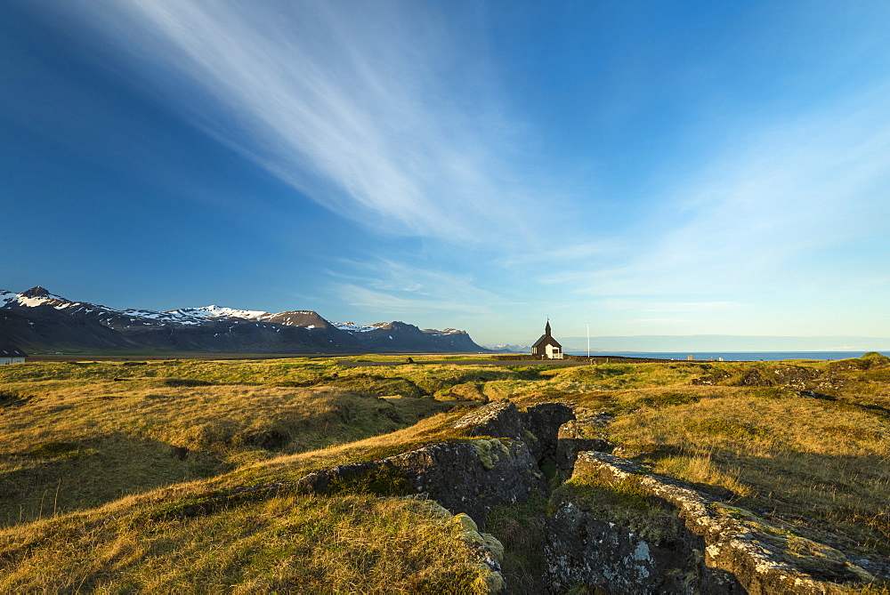 Church on lava fields at dusk, Snaefellsnes Peninsula, Budir, Iceland