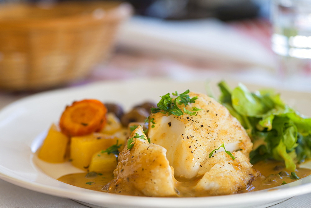 Cod dinner on a plate, Langaholt, Iceland