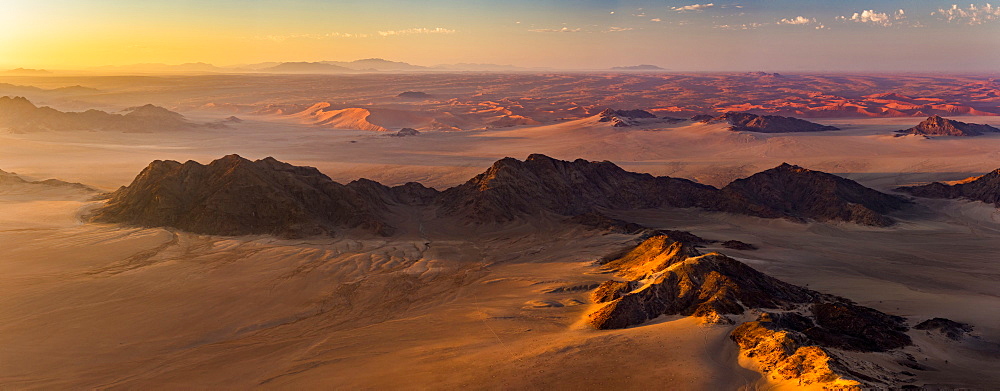 Aerial view of the sand dunes of the Namib Desert at sunrise, Sossusvlei, Hardap Region, Namibia