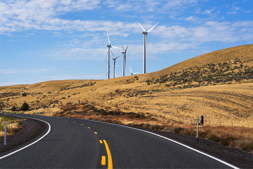 Wind turbines are found along a road in Gilliam County, Arlington, Oregon, United States of America