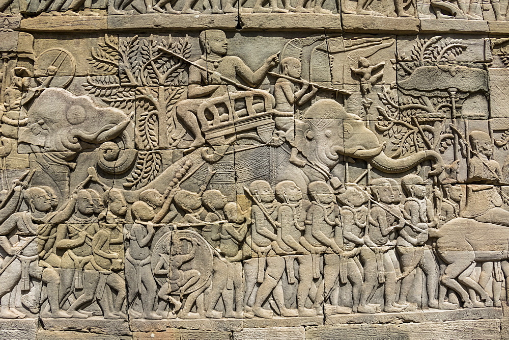 Bas-relief battle scene between the Khmer and Cham armies with Elephants on the Eastern gallery of the Bayon, Angkor Thom, Siem Reap, Cambodia