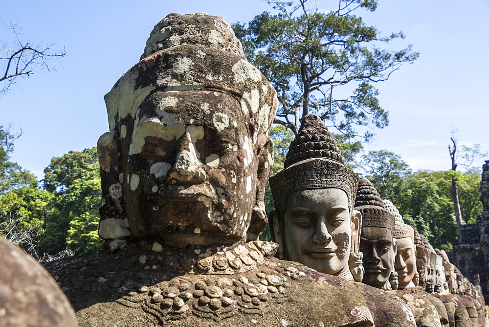 Stone figures on the causeway to the South Gate tower (Gopuram), Angkor Thom, Siem Reap, Cambodia