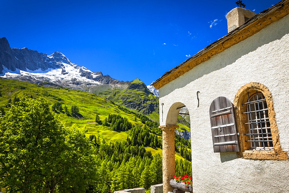 A small chapel at Ferret under blue sky, Ferret, Val Ferret, Switzerland