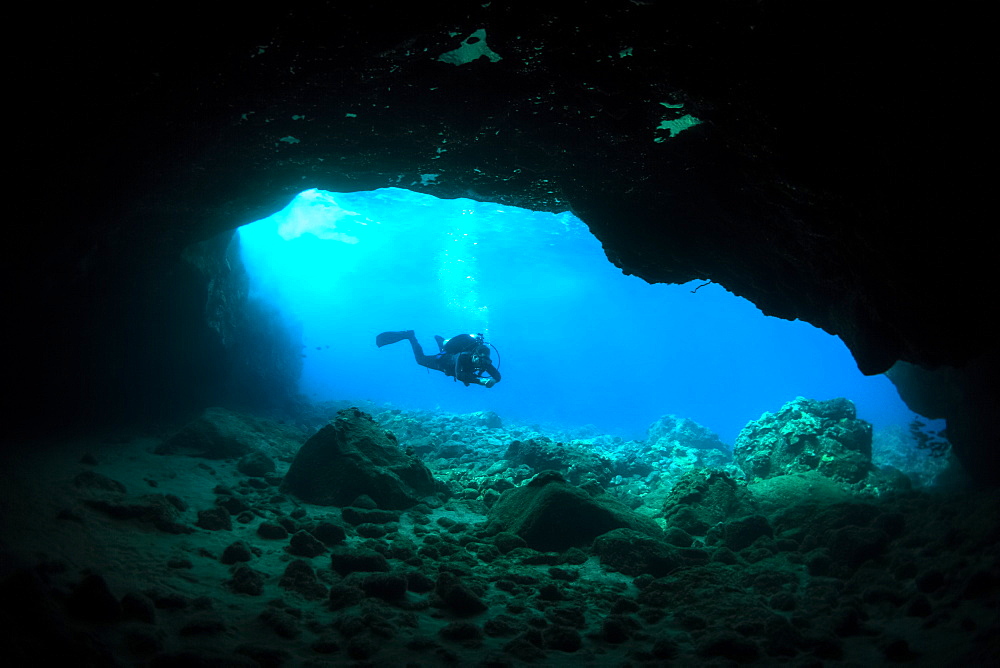 Silhouette of a scuba diver in a cave, Makena, Maui, Hawaii, United States of America