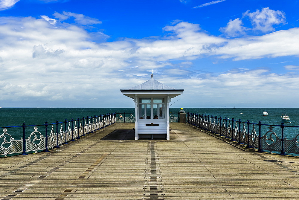 Pier with ornate railing and a view of the ocean and horizon, Swanage, Dorset, England