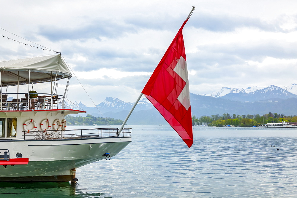 Tour boat with flag of Switzerland on Lake Lucerne, Lucerne, Lucerne, Switzerland