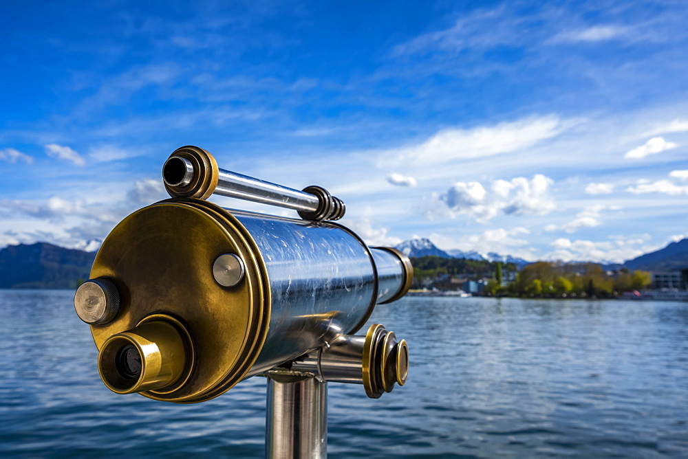 Binoculars looking out to water of Lake Lucerne and shoreline, Lucerne, Lucerne, Switzerland